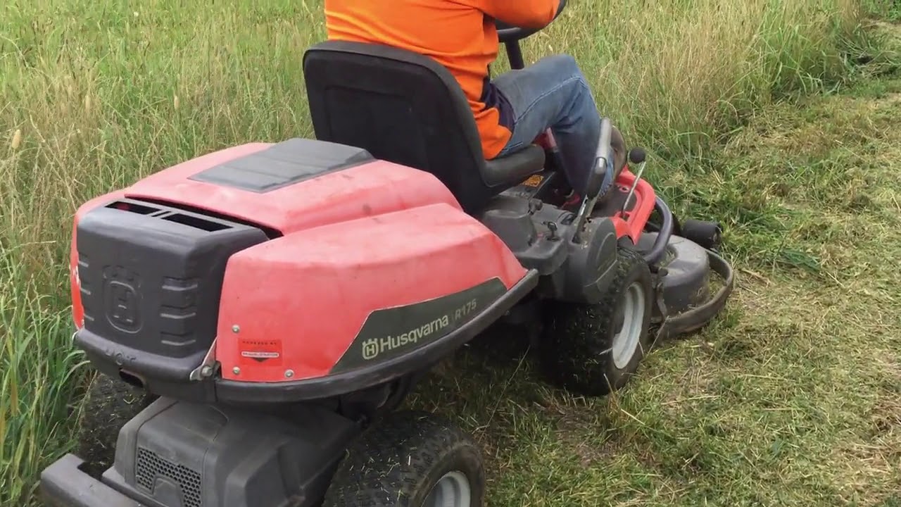 Husqvarna R175 ride-on mower cutting grass taller than its deck